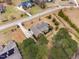 Overhead view of beautiful landscaped yard and the home's roof with mature trees at 4017 Olde Waverly Way, Fuquay Varina, NC 27526