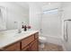Bathroom with vanity, tile floor, and combination tub and shower at 4017 Olde Waverly Way, Fuquay Varina, NC 27526
