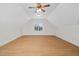 Bright, spacious bonus room with vaulted ceiling, laminate floors, and a large window at 4017 Olde Waverly Way, Fuquay Varina, NC 27526