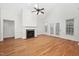 Bright living room featuring vaulted ceilings, fireplace, hardwood floors and lots of natural light at 4017 Olde Waverly Way, Fuquay Varina, NC 27526