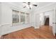 Home office featuring hardwood flooring, large window with natural light, and crown molding at 4017 Olde Waverly Way, Fuquay Varina, NC 27526