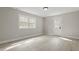 Bedroom featuring hardwood floors, natural light, and neutral color scheme at 4307 Pope Rd, Durham, NC 27707
