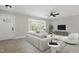 Inviting living room featuring a bay window, neutral color palette, and modern furnishings at 4307 Pope Rd, Durham, NC 27707