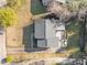 Birds eye view of home, showing roof, deck, landscaping and driveway at 449 Parnell Dr, Raleigh, NC 27610