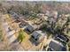 Neighborhood shot, featuring the property among lush, green trees at 449 Parnell Dr, Raleigh, NC 27610
