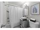 Stylish bathroom features a vessel sink, updated fixtures, and a shower-tub combo at 449 Parnell Dr, Raleigh, NC 27610