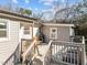 Wooden deck featuring outdoor seating; attached to a neutral colored home at 449 Parnell Dr, Raleigh, NC 27610