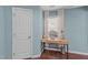 Bedroom with hardwood floors and natural light, perfect for a home office space at 449 Parnell Dr, Raleigh, NC 27610