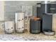 Charming kitchen details featuring coffee bar with a Keurig and cute mugs at 449 Parnell Dr, Raleigh, NC 27610