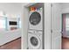 Conveniently stacked washer and dryer in a dedicated laundry closet at 449 Parnell Dr, Raleigh, NC 27610