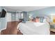 Large main bedroom with walk-in closet, wood floors, and a cozy sitting area at 449 Parnell Dr, Raleigh, NC 27610