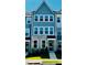 Charming townhome with a stone facade and light blue vertical siding at 526 Billingshurst Way # 211, Knightdale, NC 27545