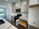Modern kitchen with stainless steel appliances and white cabinets at 526 Billingshurst Way # 211, Knightdale, NC 27545