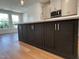 Kitchen island with quartz countertops and ample storage at 526 Billingshurst Way # 211, Knightdale, NC 27545