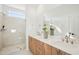 Modern main bathroom with double vanity, glass shower, and stylish fixtures at 526 Billingshurst Way, Knightdale, NC 27545