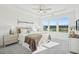 Bright main bedroom with tray ceilings, large windows, and neutral decor at 526 Billingshurst Way, Knightdale, NC 27545