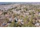A beautiful community seen from above with lush tree coverage at 595 Weathersfield # A, Pittsboro, NC 27312