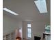 View of the home's interior showing two skylights and high ceilings at 595 Weathersfield # A, Pittsboro, NC 27312