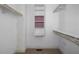 Spacious walk-in closet with built-in shelving and ample storage solutions at 595 Weathersfield # A, Pittsboro, NC 27312