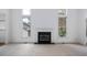 Bright living room with fireplace, carpet and natural light at 595 Weathersfield # A, Pittsboro, NC 27312