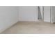 Unfurnished room with carpeted floors and access to staircase at 595 Weathersfield # A, Pittsboro, NC 27312