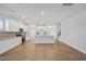 Open concept kitchen with large island, stainless appliances, and modern design at 625 Spellbrook Rd, Zebulon, NC 27597