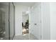 A bathroom with a shower on the left side and a door on the right side at 704 Vance St, Mebane, NC 27302