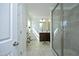 A bathroom featuring double sink, with shower room on the right side at 704 Vance St, Mebane, NC 27302