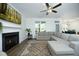 Cozy living area with fireplace and view of the outdoors at 704 Vance St, Mebane, NC 27302