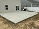 Large concrete patio in the backyard, perfect for entertaining and outdoor activities at 745 Little Patch St, Zebulon, NC 27597