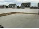 New concrete patio in fenced backyard offers great outdoor living space at 745 Little Patch St, Zebulon, NC 27597