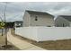 A backyard featuring a white fence, offering privacy and security for outdoor enjoyment at 745 Little Patch St, Zebulon, NC 27597