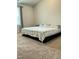 Cozy bedroom featuring a comfortable bed, neutral carpet, and ample natural light at 745 Little Patch St, Zebulon, NC 27597