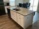 Spacious kitchen island offering granite countertops and storage, complemented by stainless steel dishwasher at 745 Little Patch St, Zebulon, NC 27597