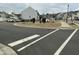 A well-maintained neighborhood with modern homes, landscaped common areas, and neatly paved streets at 745 Little Patch St, Zebulon, NC 27597