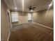 Spacious bedroom featuring a ceiling fan and natural light at 945 Lynch Rd, Selma, NC 27576
