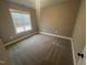 Cozy bedroom with neutral carpet and plenty of natural light at 945 Lynch Rd, Selma, NC 27576