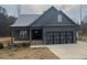 Charming single-story home with a two-car garage and a well-manicured front yard at 945 Lynch Rd, Selma, NC 27576