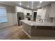 Kitchen featuring stainless steel appliances, granite countertops, island, and hardwood floors at 945 Lynch Rd, Selma, NC 27576
