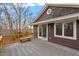 Exterior view of home features a deck with views of wooded area at 95 Blueberry Rdg, Pittsboro, NC 27312
