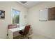 Bright home office with a large window overlooking nature, desk and chair perfect for working remotely at 95 Blueberry Rdg, Pittsboro, NC 27312