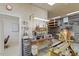 Bright workshop featuring a lathe, various tools, ample workspace and storage, ideal for woodworking at 95 Blueberry Rdg, Pittsboro, NC 27312