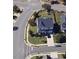 Aerial view of two-story home and lot, showing its landscaping, driveway, and surrounding neighborhood at 1001 Hope Springs Ln, Morrisville, NC 27560