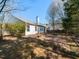 Large backyard featuring a patio area perfect for relaxing and enjoying the outdoors at 101 Tiverton Woods Dr, Holly Springs, NC 27540