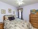 Cozy bedroom with natural light and a decorative window treatment that adds a charming touch at 101 Tiverton Woods Dr, Holly Springs, NC 27540