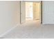 Bedroom with carpet floor and two entry doors at 103 Kirkwood Dr., Chapel Hill, NC 27514