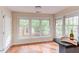 Bright dining area with hardwood floors and large windows at 103 Kirkwood Dr., Chapel Hill, NC 27514