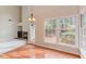Dining room with natural light, hardwood floors, and living area view at 103 Kirkwood Dr., Chapel Hill, NC 27514