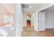 Open foyer featuring tiled flooring, views of the dining and kitchen areas at 103 Kirkwood Dr., Chapel Hill, NC 27514
