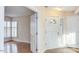 Welcoming foyer with tiled floor, front door, and view of the living area at 103 Kirkwood Dr., Chapel Hill, NC 27514